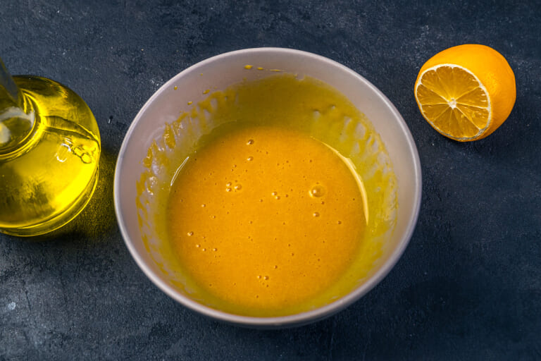 Homemade mayonnaise: Adding vegetable oil to the egg yolk mixture drop by drop