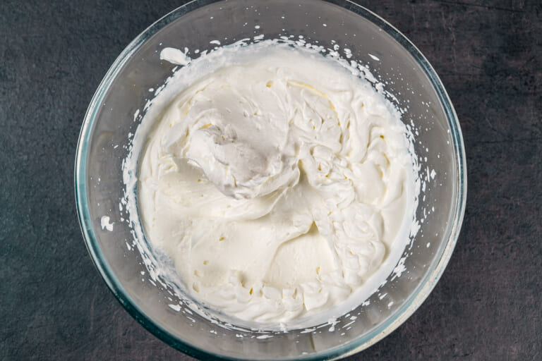 Cream whipped to soft peaks