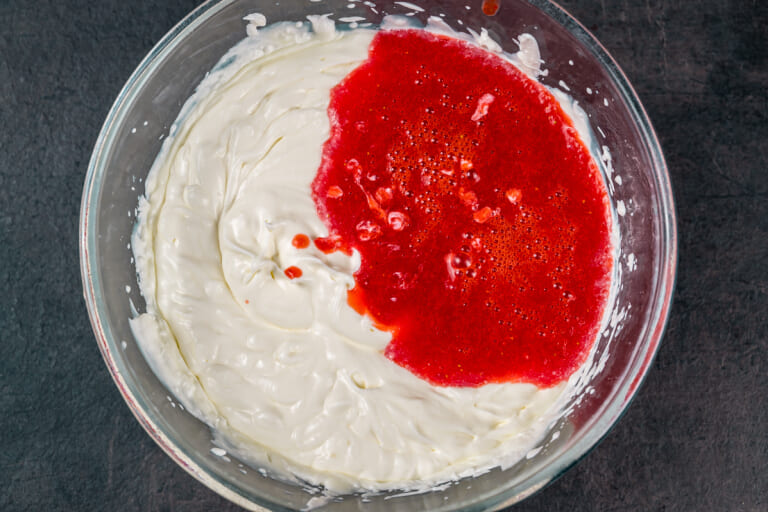 Whipped cream with mashed strawberries