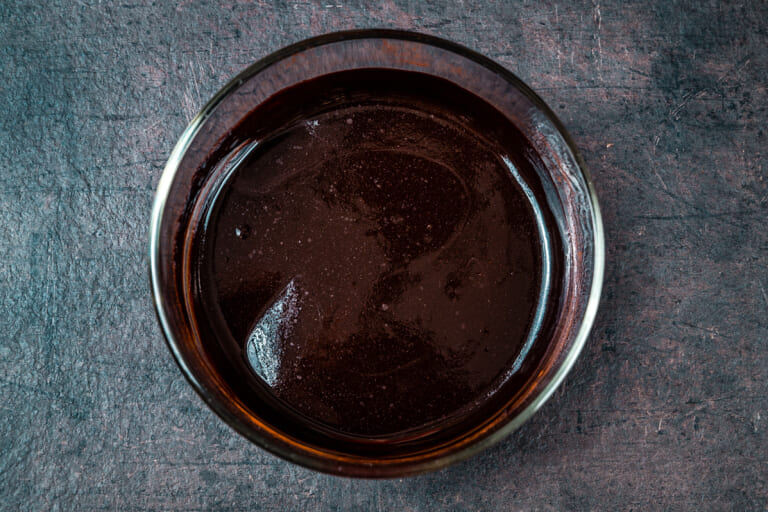 Melted butter mixed with cocoa for the frosting for Zucchini Brownies Melted butter mixed with cocoa for the frosting for Zucchini Brownies