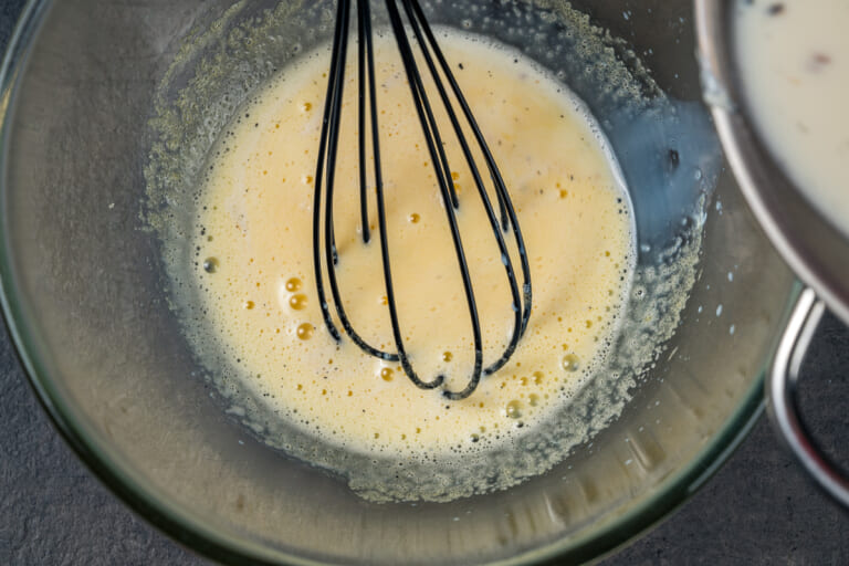 Chicken egg yolks tempered with hot milk Chicken egg yolks tempered with hot milk