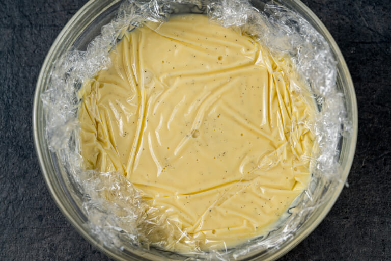 English cream covered with plastic wrap in contact English cream covered with plastic wrap in contact