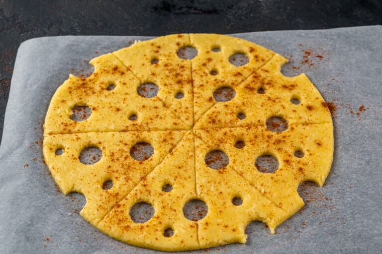 Sprinkle the biscuits with paprika