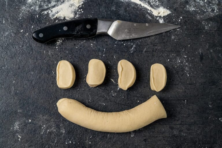 Dough roll cut into equal parts