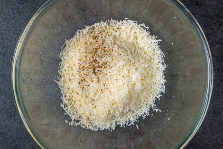 Grated Pecorino seasoned with black paper