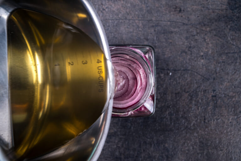 Jar of onions filled with marinade