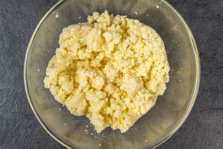 Mixed sweet farmer's cheese filling ready for blintzes
